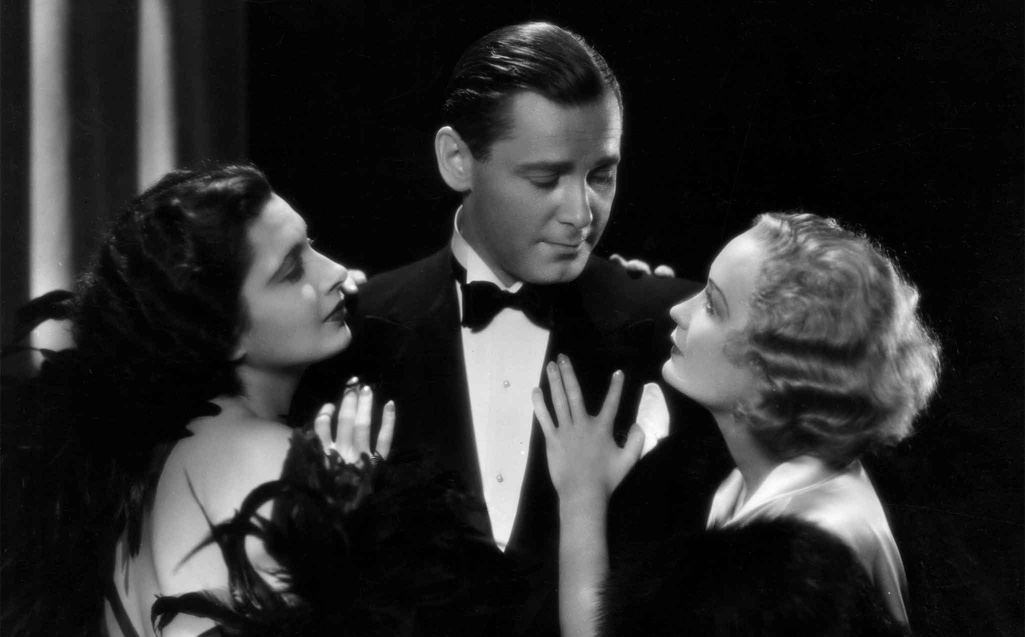 Miriam Hopkins, Kay Francis, and Herbert Marshall in Trouble in Paradise.